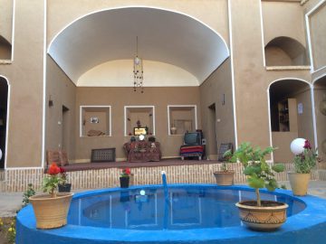 Kadkhoda Ecolodge |The adobe walls and the tall hall make you feel a certain nostalgia. The house has a green yard, a blue pond, a...